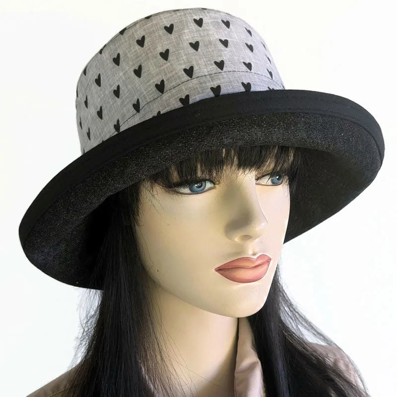 102-h Sunblocker with adjustable fit, black hearts on grey with black denim brim