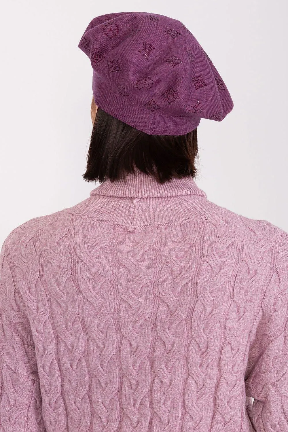 AT Knitted beret with interesting rhinestone application.