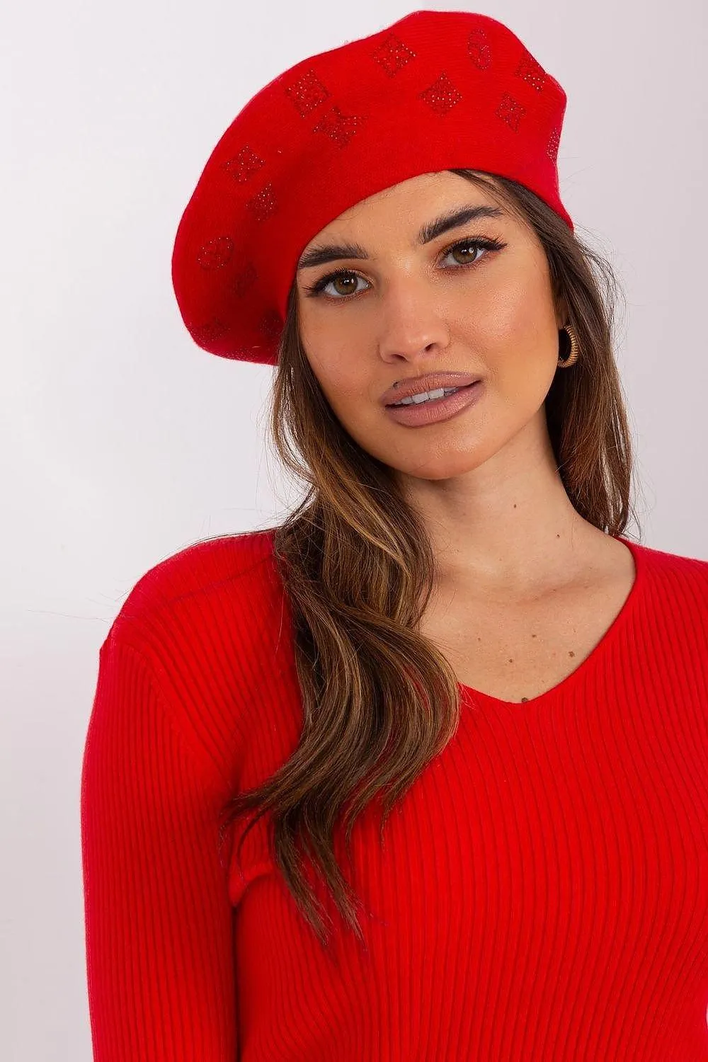 AT Knitted beret with interesting rhinestone application.